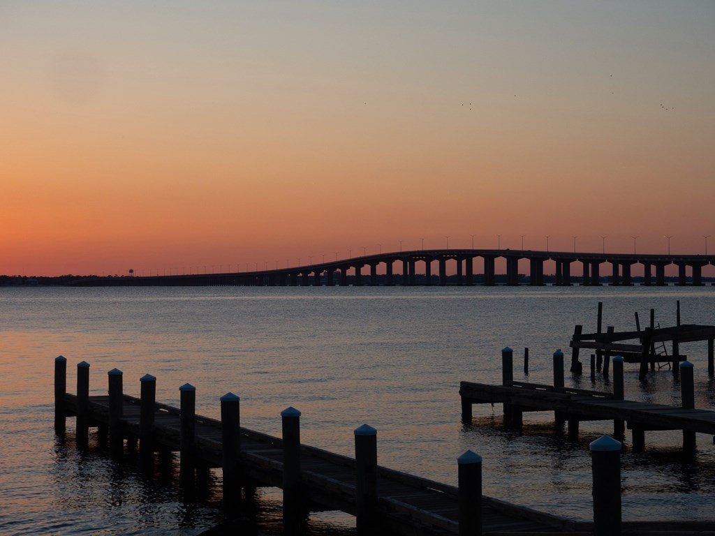 Docks and the arched Bay Saint Louis Bridge in Mississippi